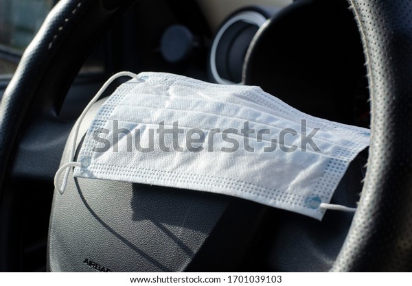 Doctor mask\
and corona virus in the car,\
covid-19