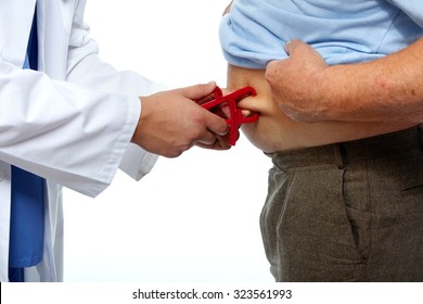 Doctor Measuring Obese Man Stomach With Body Fat Calipers.