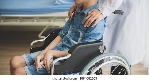 Doctor motivate disabled person patient leg at hospital, Muscle weakness - Shutterstock ID 1894082203