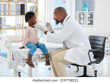 Doctor, Mouth Of Child And Black Man Helping Little Girl In Checkup Or Consultation At A Hospital. Medical Male Expert Or Pediatrician Examining Kid For Throat Infection, Illness Or Sore In Clinic.