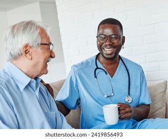 Doctor or nurse caregiver with senior man drinking tea or coffee at home or nursing home - Powered by Shutterstock