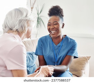 Doctor or nurse caregiver with senior woman talking and having fun at home or nursing home - Powered by Shutterstock