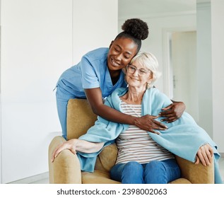 Doctor or nurse caregiver with senior woman, covering her with a blanket, helping and taking care of, at home or nursing home - Powered by Shutterstock