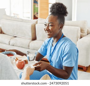 Doctor or nurse caregiver serving a meal to senior man at home or nursing home - Powered by Shutterstock