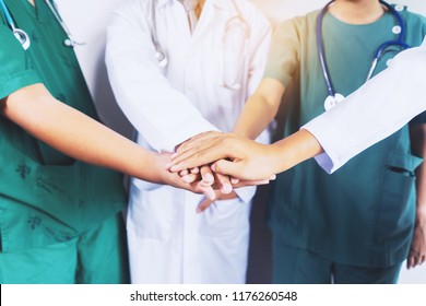 Doctor and nurse coordinate hands. Concept Teamwork, happy doctors working together as team for motivation, success medical health care 