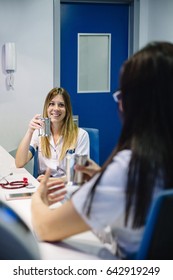 Doctor And Nurse Having Coffee Break In Hospital 