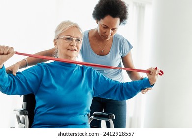 Doctor or nurse or physiotherapist caregiver exercise with senior woman at clinic or nursing home - Powered by Shutterstock