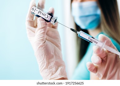 Doctor, nurse, scientist hand in  gloves holding flu, measles, coronavirus, covid-19 vaccine disease preparing for child, baby, adult, man and woman vaccination shot, medicine and drug concept.