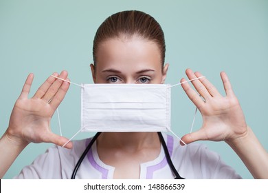 Doctor. Nurse Smiling Behind Surgeon Mask. 