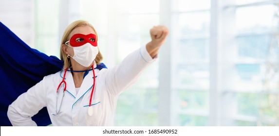 Doctor Or Nurse Wearing Surgical Face Mask In Superhero Cape. Medical Staff During Coronavirus Outbreak. Super Hero Power For Clinic And Hospital Personal.