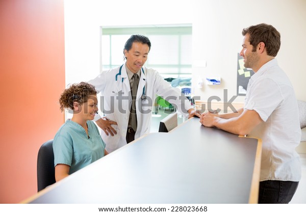 photo art of nurses on their computers at work