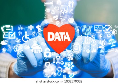 Doctor Offers Red Heart With Data Text Icon On A Virtual Interface. Big Data Medicine Modern Health Cre Information Technology Concept. Smart Heart Bigdata CardiologyTech.