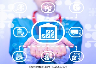 Doctor Offers A Warehouse Icon On A Virtual Screen. Medicinal Pills Warehouse Logistics Medicine. Supply Chain Hospital Concept. Delivery Healthcare Service. Medical Resources Planning.