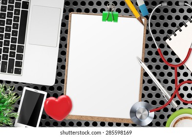 Doctor Office Desk Top View With Blank Paper On Clipboard