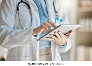 Doctor, Office And Tablet For Research, Email Or Communication. Medic, Hospital And Reading Article, Data Or Health Magazine On Web, While Working With Technology In Healthcare Center Or Clinic