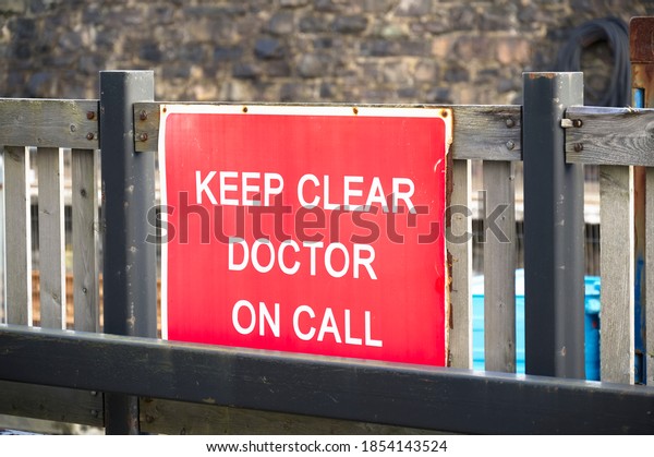 Doctor on\
call keep clear sign at hospital car\
park