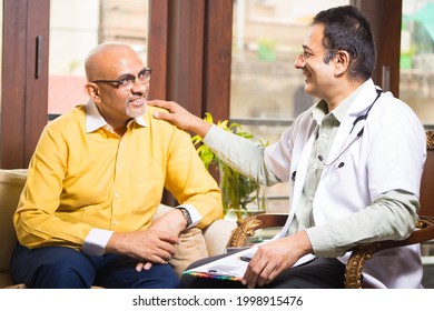 Doctor On Call Visiting Senior Man At Home