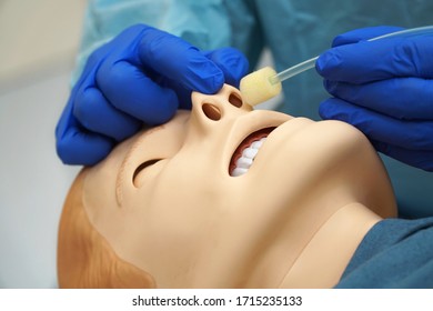 Doctor In Operating Theater Demonstrates The Insertion Of A Nasal Tube For Ventilation Of Patient Via Nose Using A Ventilator In A Hospital Or Clinic                 