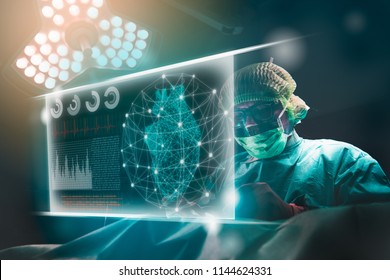 Doctor operation in operation room at hospital.surgeon analyzing patient heart testing result on technological digital futuristic virtual interface, digital holographic.innovative concept. - Powered by Shutterstock