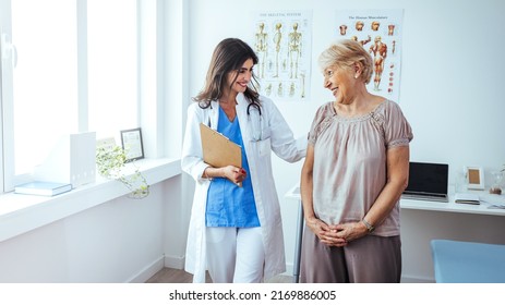 Doctor and patient discussing something at hospital . Medicine and health care concept. Doctor and patient. Patient Having Consultation With Doctor In Office. Doctor consulting with a patient  - Powered by Shutterstock