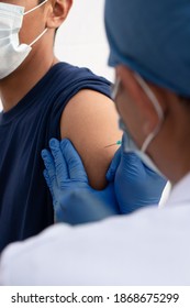 Doctor And Patient During Vaccination Campaign On Latin America, Hispanic People Flu