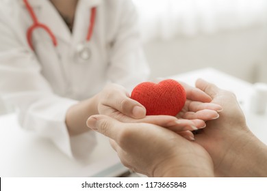 Doctor And Patient Hands Holding Red Heart, Health Care Love, Give, Hope And Family Concept, World Heart Day,world Health Day