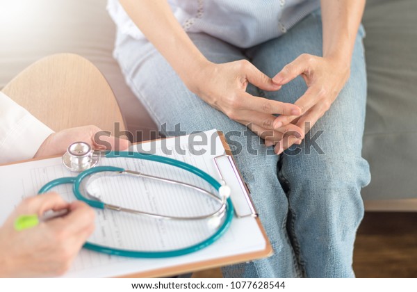 Doctor and patient healthcare concept.\
Gynecologist physician consulting and examining woman patient\
health in Obstetrics and Gynecology department in medical hospital\
health service center.