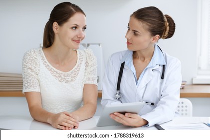 Doctor Patient Sitting Discussing Health Examination Stock Photo ...