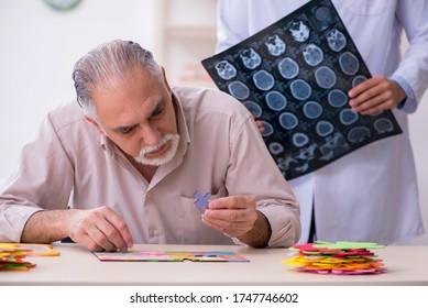 Doctor And Patient Suffering From Alzheimer Disease