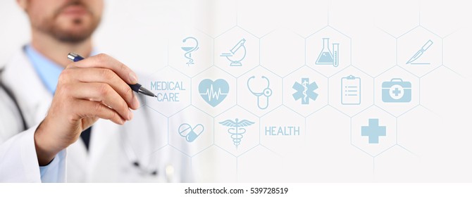 Doctor With A Pen Pointing Medical Icons On Touchscreen