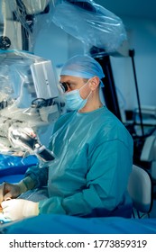 Doctor Performs Minimally-invasive Surgeon Using A Robotic Device. Minimal Invasive Surgical Innovation, Medical Robot Surgery With Endoscopy.