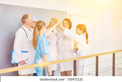 Doctor Or Physician High Five Team For Motivation