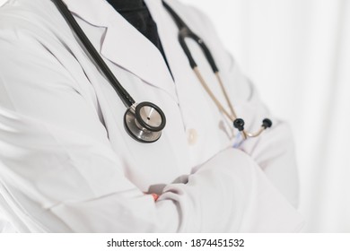 Doctor or physician in white dress uniform and stethoscope at the hospital or clinic Medical Technology, Health and Medical Concept. Physician With Stetoscope In Hospital