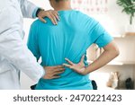 Doctor physiotherapists treat lower back pain in patients in the hospital. back injuries and back massages for muscle recovery.The concept of treating illnesses with physical therapy.