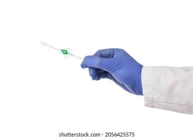 Doctor Plastic Surgeon Holds In His Hand A Medical Cannula For Plastic Surgery. White Background, Isolate