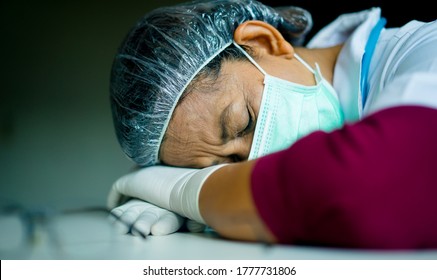 Doctor In PPE Suit Has Stress In Hospital.Medical Healthcare Coronavirus Covid-19 Concept.Indian Doctor Rest And Stress Of Overworked Doctor Nurse Hospital Medical Care Team Delta Coronavirus.vaccine.