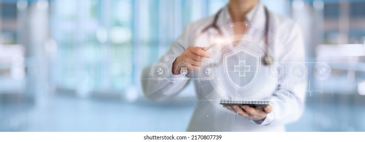 Doctor presenter shows health care system on virtual computer screen. - Shutterstock ID 2170807739