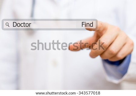 doctor pressing find doctor  on virtual search bar. concept of use of internet for medical assistance