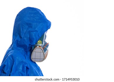 A doctor in a protective suit and a full face protective mask with a pen writes the patient's data in a log - Shutterstock ID 1714953010