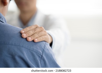 Doctor or psychiatrist shakes hands encouragement the patient and care having a consultation on diagnostic examination on male disease or mental illness in a clinic or hospital mental health service  - Shutterstock ID 2188082723