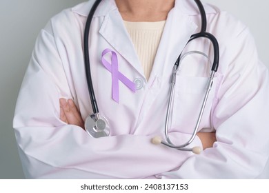 Doctor with purple ribbon for world cancer day, lupus, Pancreatic, Esophageal, Testicular cancer, world Alzheimer, epilepsy, Sarcoidosis, Fibromyalgia and domestic violence Awareness month concepts - Powered by Shutterstock