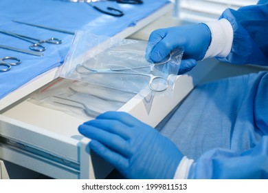 Doctor Putting Medical Clamps Into Drawer Stock Photo 1999811513 ...