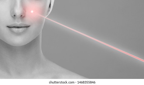 Doctor Removing Moles Using Laser Ray. Beauty Portrait Of A Young Woman. Birthmark Removal, Plastic Surgery, Skin Lifting And Aesthetic Medicine.