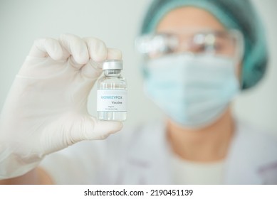 A Doctor Or Scientist Is Holding A Vaccine Vial For Monkeypox Or Clade.