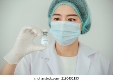 A Doctor Or Scientist Is Holding A Vaccine Vial For Monkeypox Or Clade.