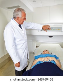 Doctor and senior patient at MRI machine in radiology in a hospital - Shutterstock ID 148769468
