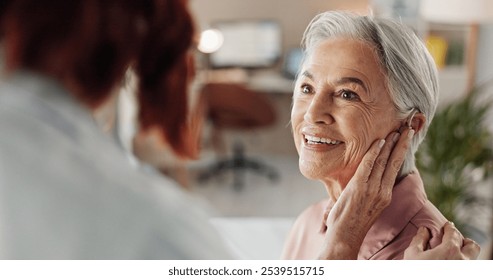 Doctor, senior woman and hearing aid in clinic for geriatric support, tinnitus and help for sound waves. Ent, otolaryngology and patient with cochlear implant for audio, healthcare and auditory tech