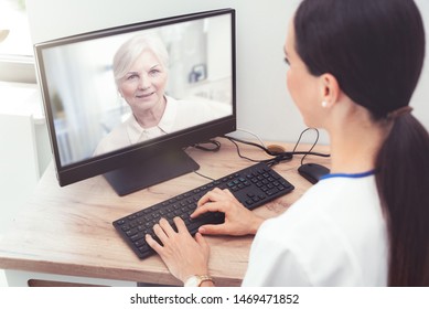 Doctor and senior woman patient medical consultation, telehealth, telemedicine, remote health care concept.