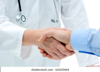 Doctor Shakes Hands With A Patient Isolated On White  Background