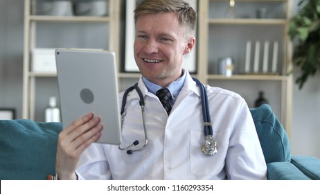 Doctor Sharing Good News On Video Chat On Tablet